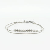 Zilveren Bead fidget armband van RVS met beweegbare kralen, minimalistisch en rustgevend – Luminora