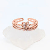 Roségouden Serenity fidget ring met witte steentjes – elegante stijl en ontspanning – Luminora