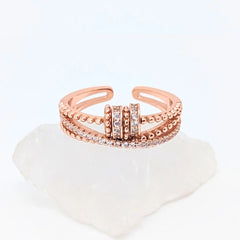 Roségouden Serenity fidget ring met witte steentjes – elegante stijl en ontspanning – Luminora