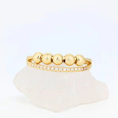 Tranquility anxiety ring in goudkleur, verstelbare ring met steentjes voor rust en ontspanning – Luminora