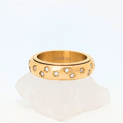 Allura Fidget Ring van goud edelstaal met bloemgravure en kleine steentjes – Luminora