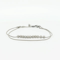 Zilveren Bead fidget armband van RVS met beweegbare kralen, minimalistisch en rustgevend – Luminora