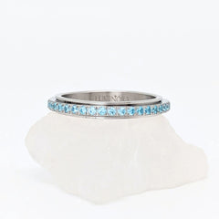 Sora fidget ring van edelstaal met fonkelende blauwe kristallen – Luminora